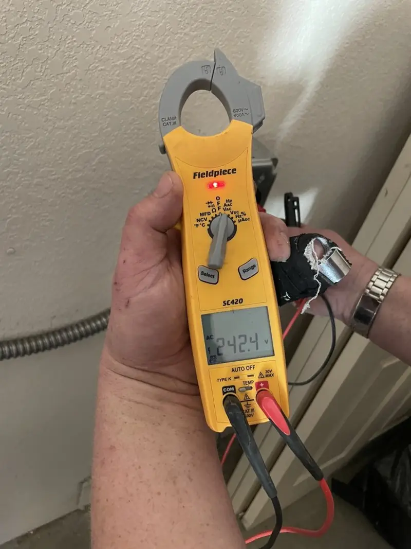 Voltage testing with clamp meter during Generator Installation in Lawrenceburg